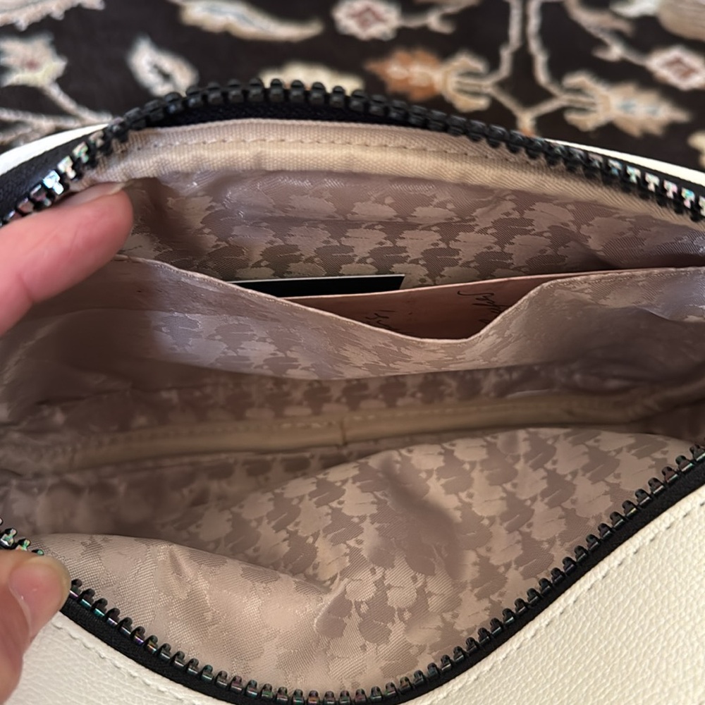 Karl Lagerfeld Maybelle Double Zip White Iridescent Crossbody Camera
Bag - Picture 7 of 17